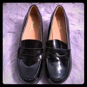 Black platform loafers